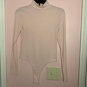 Pink long sleeve body suit